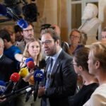 New center-right government in France announced 2 months after divisive elections