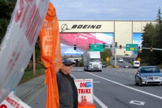 Boeing reports $6 billion quarterly loss ahead of vote by union workers who have crippled production