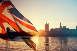 British union jack flag and Parliament house at city of Westminster in the background