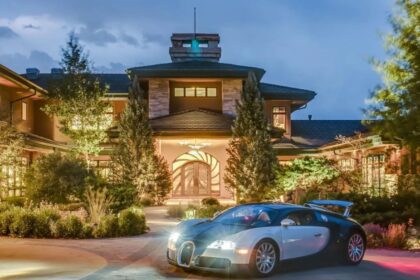 Retired race car driver re-lists Evergreen mansion for $19 million after $6M price drop