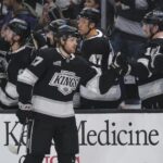 Kings glad to be back on home ice, beating Sharks after seven-game trip