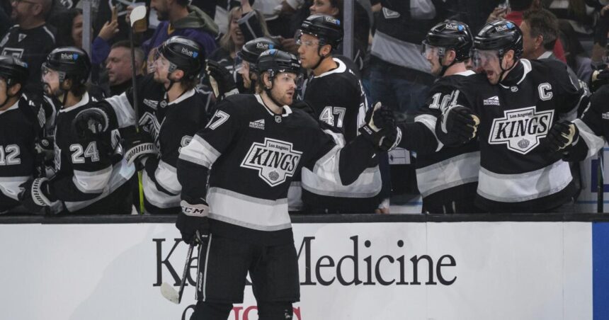 Kings glad to be back on home ice, beating Sharks after seven-game trip