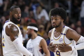 Will LeBron and Bronny James make history Tuesday? Lakers won't say