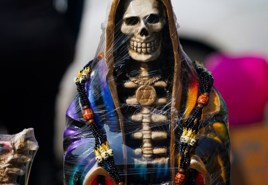 A leader of Mexican folk saint cult 'La Santa Muerte' is killed at an altar to the skeletal figure