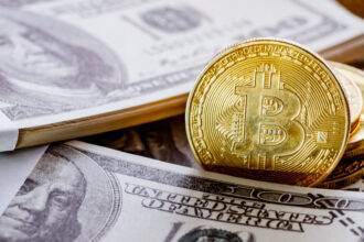 US Dollar and Bitcoin placed together to show investment concept