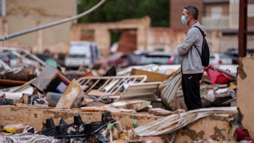 Feeling abandoned after historic floods, Valencians press on with cleanup effort