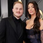 LOS ANGELES, CALIFORNIA - FEBRUARY 04: (L-R) Zach Bryan and Brianna LaPaglia attend the 66th GRAMMY Awards at Crypto.com Arena on February 04, 2024 in Los Angeles, California. (Photo by Neilson Barnard/Getty Images for The Recording Academy)