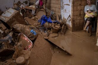 Rubbish build up after Spanish floods leads to health issues as search for missing people continues