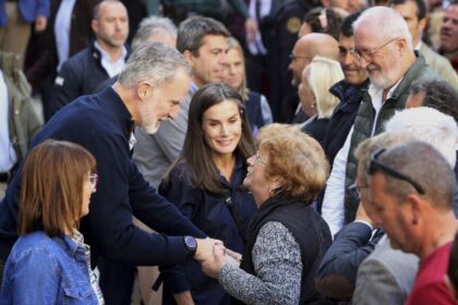 Spain's royals return to flood-hit region weeks after being pelted with mud