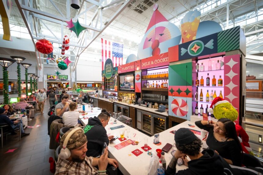 Stuck at DIA? A seasonal “layover lounge” has holiday-themed cocktails, Santa visits