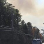 New York parks employee dies fighting fires as air quality warnings issued there and New Jersey