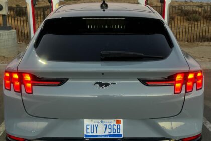 Driving a Ford Mustang EV along Interstate 5, but charging up at Tesla station. Is that a thing?