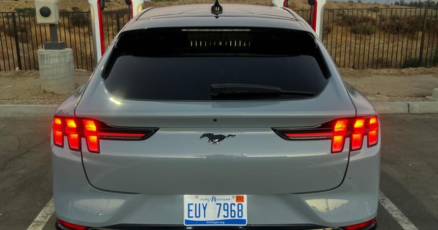 Driving a Ford Mustang EV along Interstate 5, but charging up at Tesla station. Is that a thing?