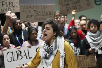 Nations at U.N. climate talks agree on at least $300 billion for poor countries in compromise deal