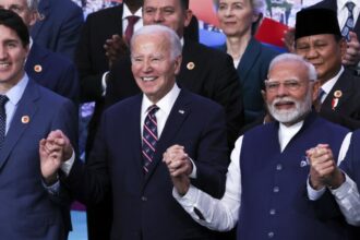 Biden appeals to world leaders to stay in the climate fight as Trump shadows his efforts