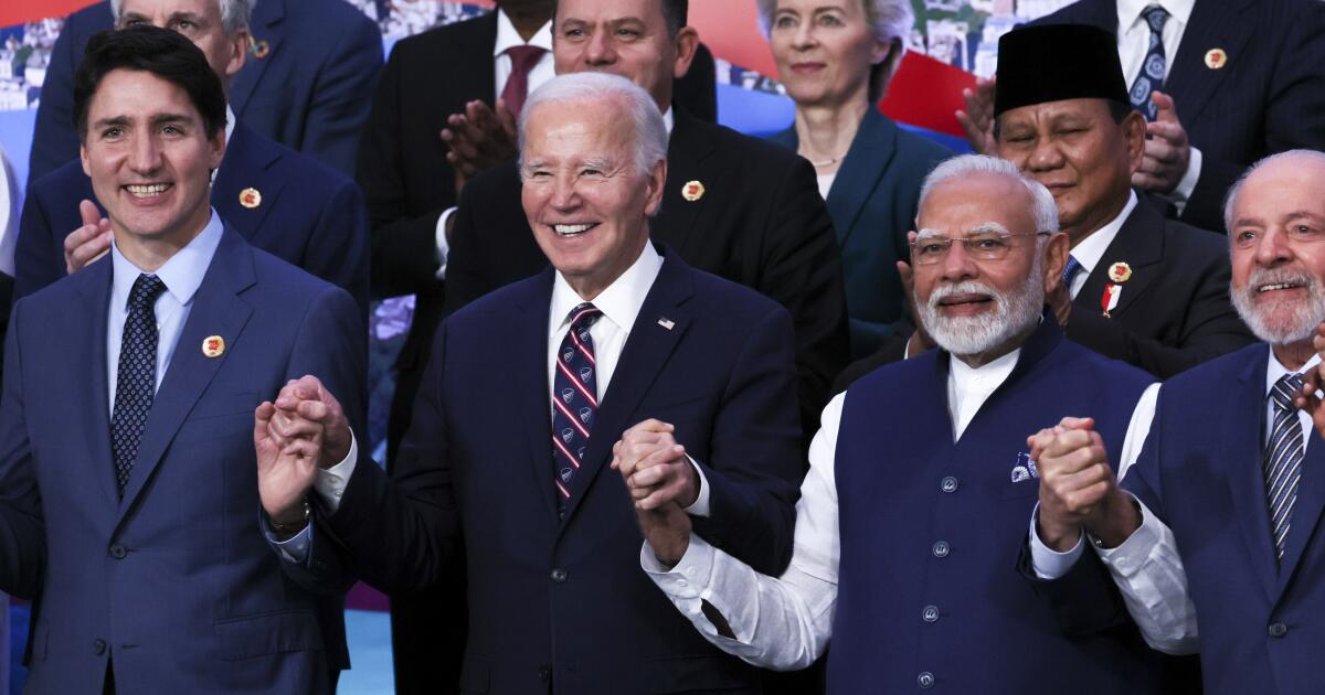 Biden appeals to world leaders to stay in the climate fight as Trump shadows his efforts