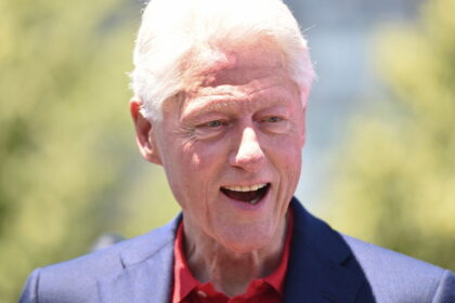 Bill Clinton hospitalised but in good spirits