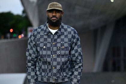 US basket player LeBron James poses on the red carpet as he arrives for 'The Prelude to the Olympics' at The Fondation Louis Vuitton in Paris on July 25, 2024, ahead of the 2024 Paris Olympics. (Photo by JULIEN DE ROSA / AFP) (Photo by JULIEN DE ROSA/AFP via Getty Images)