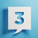 Number three written on white chat bubble on blue background