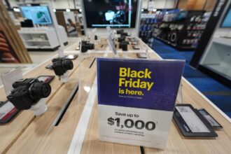 Retailers coax Black Friday shoppers into stores with big discounts and giveaways