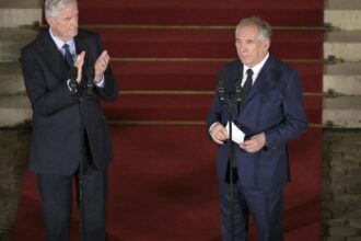 Why did French President Macron pick François Bayrou as France's next PM?