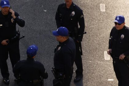 It cost $1.7 million to have the LAPD work — and wear Dodgers caps — at World Series parade