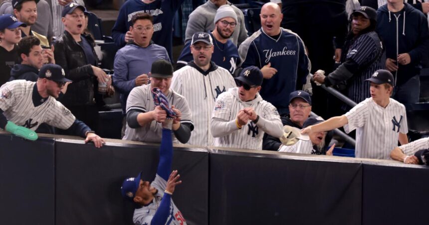 Mookie Betts 'thought about throwing the ball at' Yankees fans who grabbed his glove, wrist